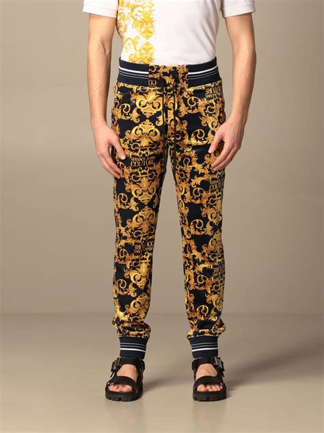 versace print trousers|Versace denim pants.